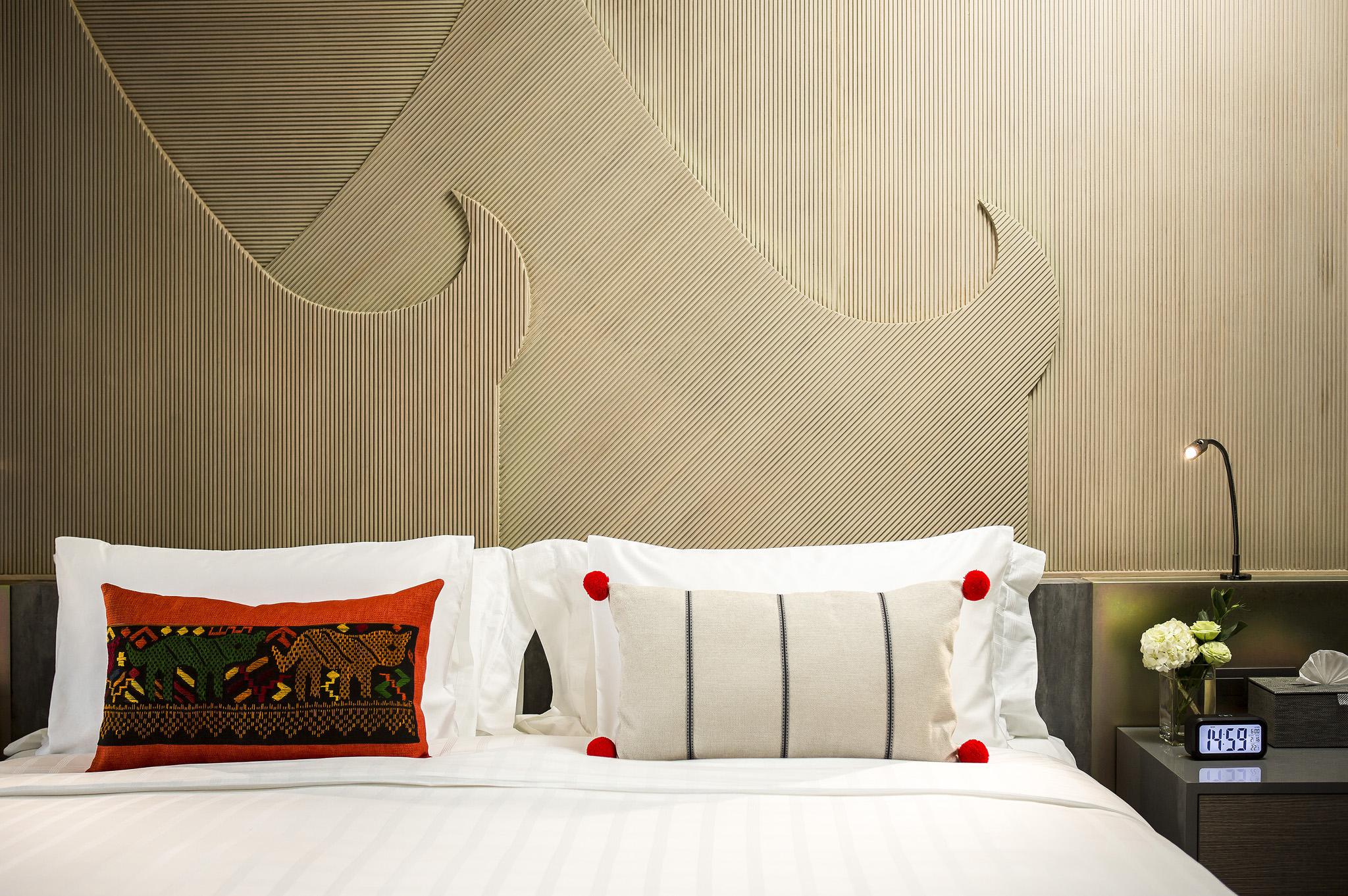 U Nimman Chiang Mai Hotel Екстериор снимка A bed with cushions