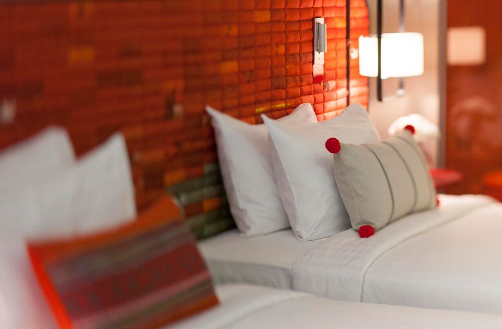 U Nimman Chiang Mai Hotel Екстериор снимка A bed with pillows